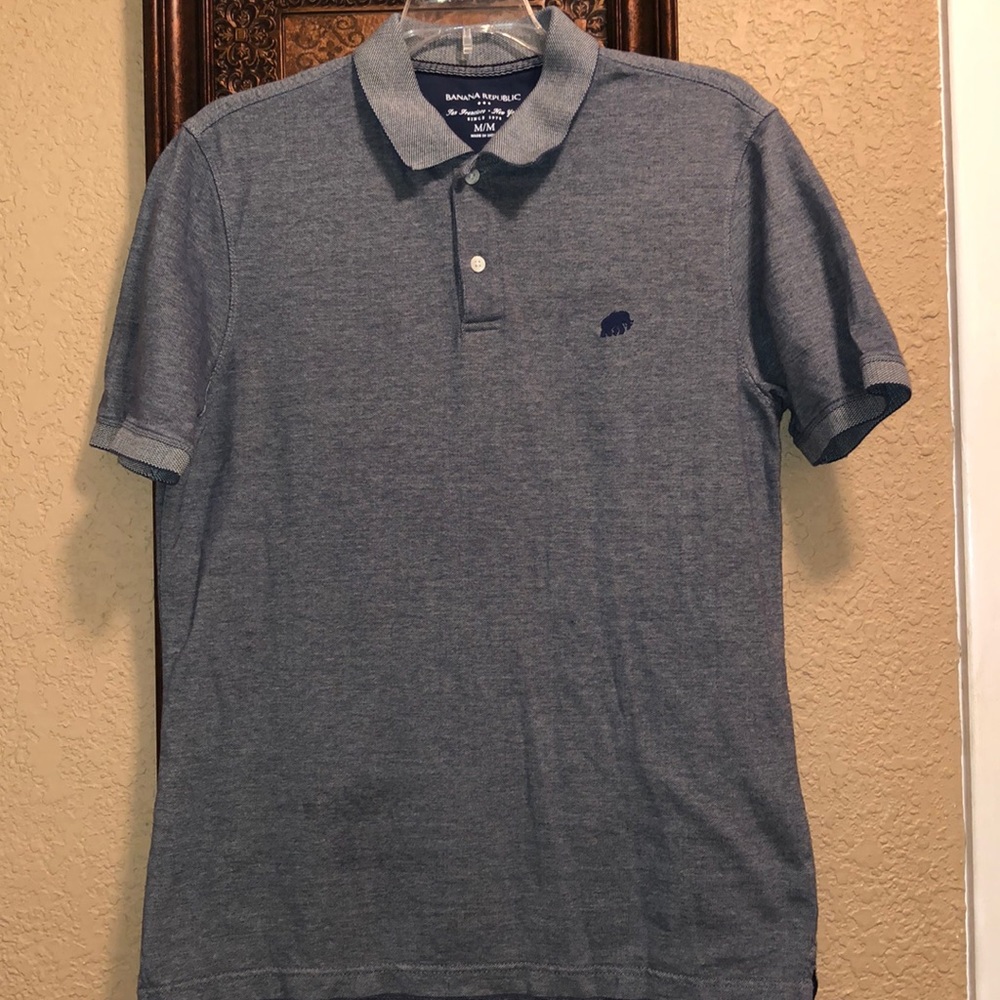 Gently worn Banana Republic Blue/Gray Polo Shirt. Logo on front.  100% cotton